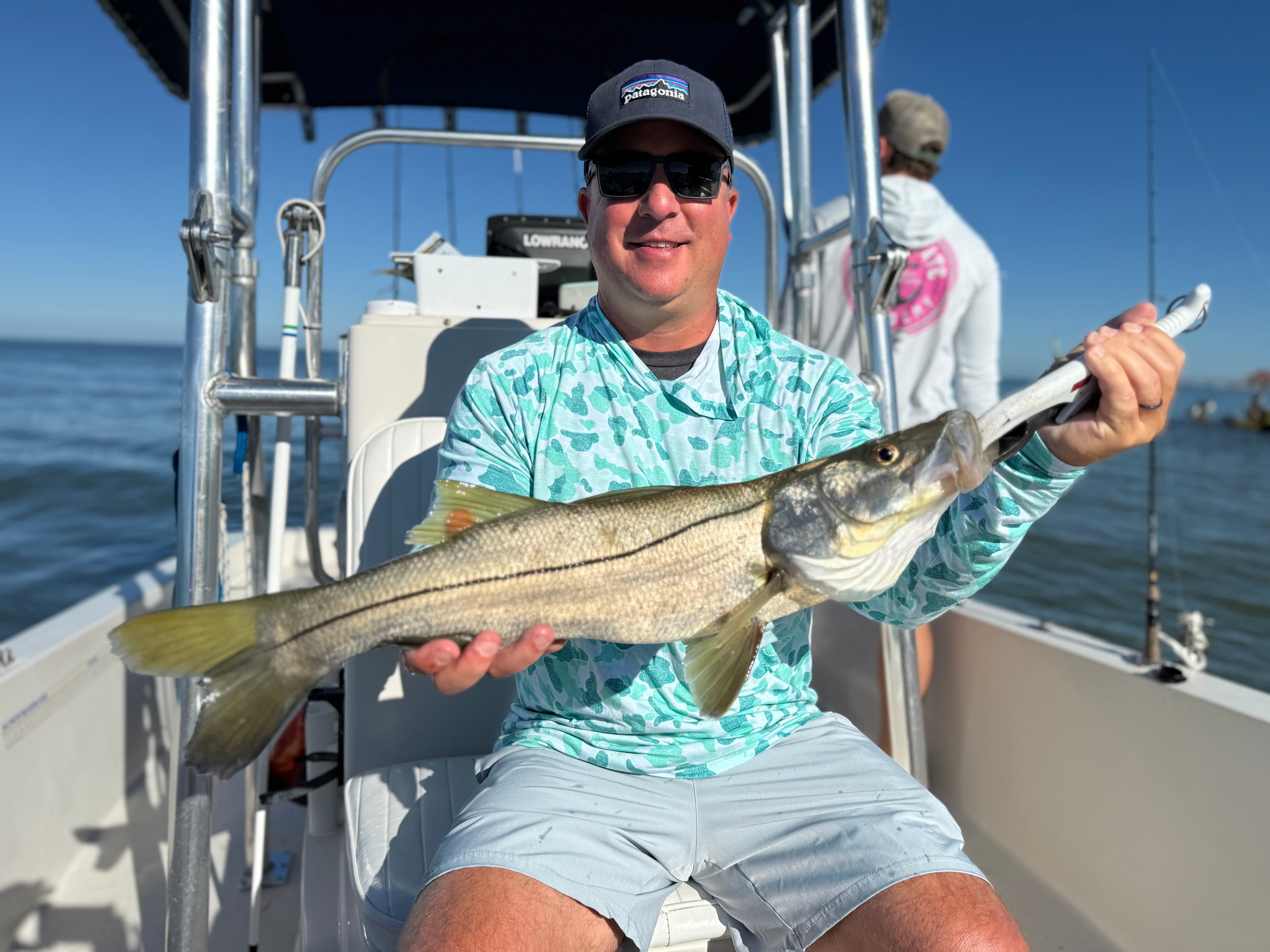 Angler with spanish mackerel on nearshore charter